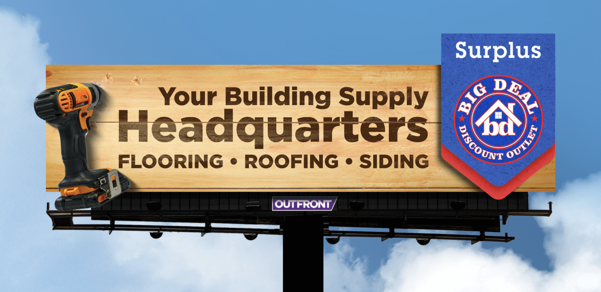 Billboard advertising building supply headquarters with flooring, roofing, and siding.
